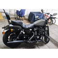 Side view of motorcycle with mid-mount rider footboards installed