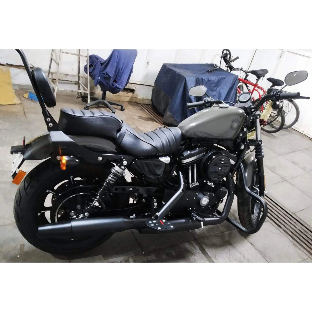 Side view of motorcycle with mid-mount rider footboards installed
