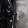 AeeDEA rider footboard mounted beside the motorcycle frame