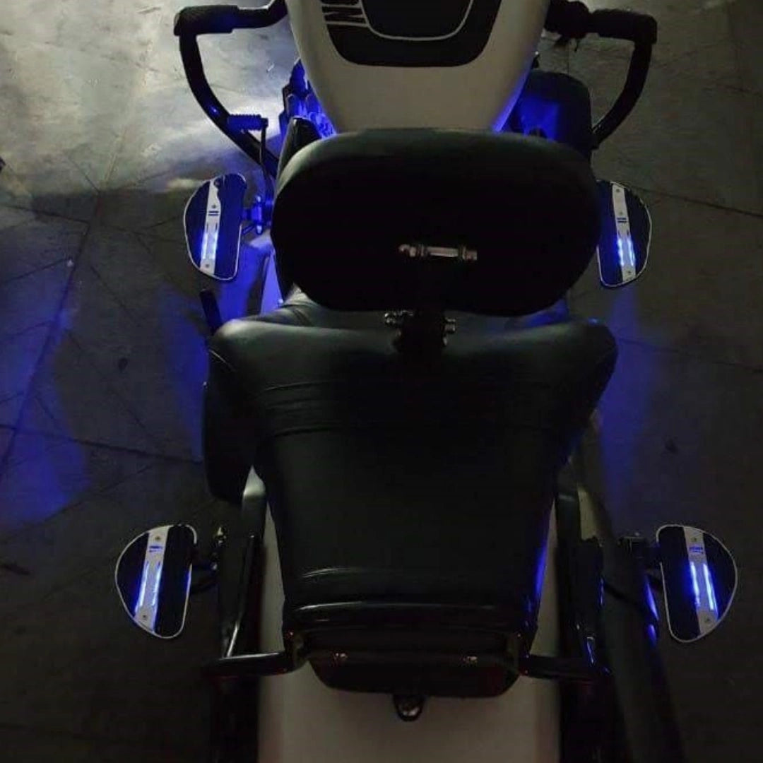 Rear view of a motorcycle showing the installed rider footboards on both sides