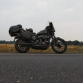 Motorcycle fitted with a Batwing fairing photographed outdoors