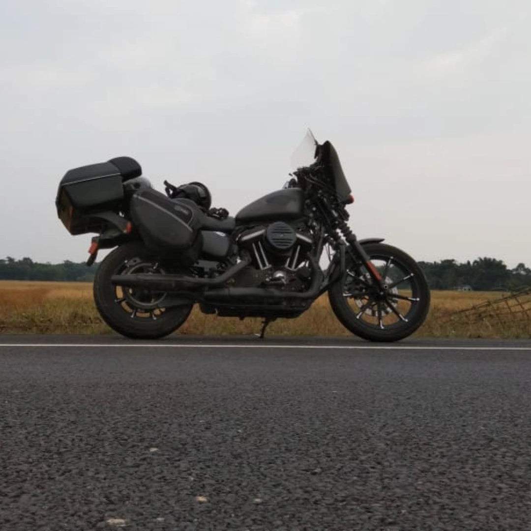 Motorcycle fitted with a Batwing fairing photographed outdoors