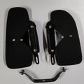 Rear view of two black heat deflector shields showing their mounting brackets and hardware
