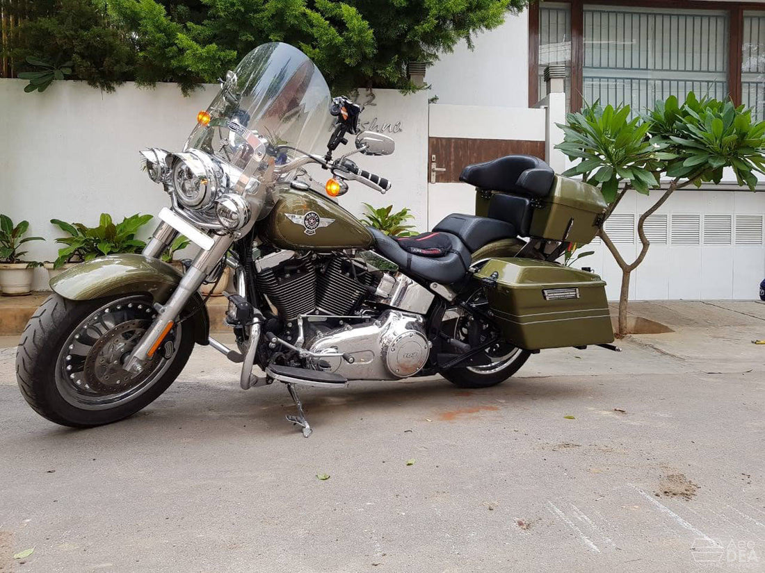 AeeDEA side panniers and top box installed on a touring motorcycle with a tall windshield