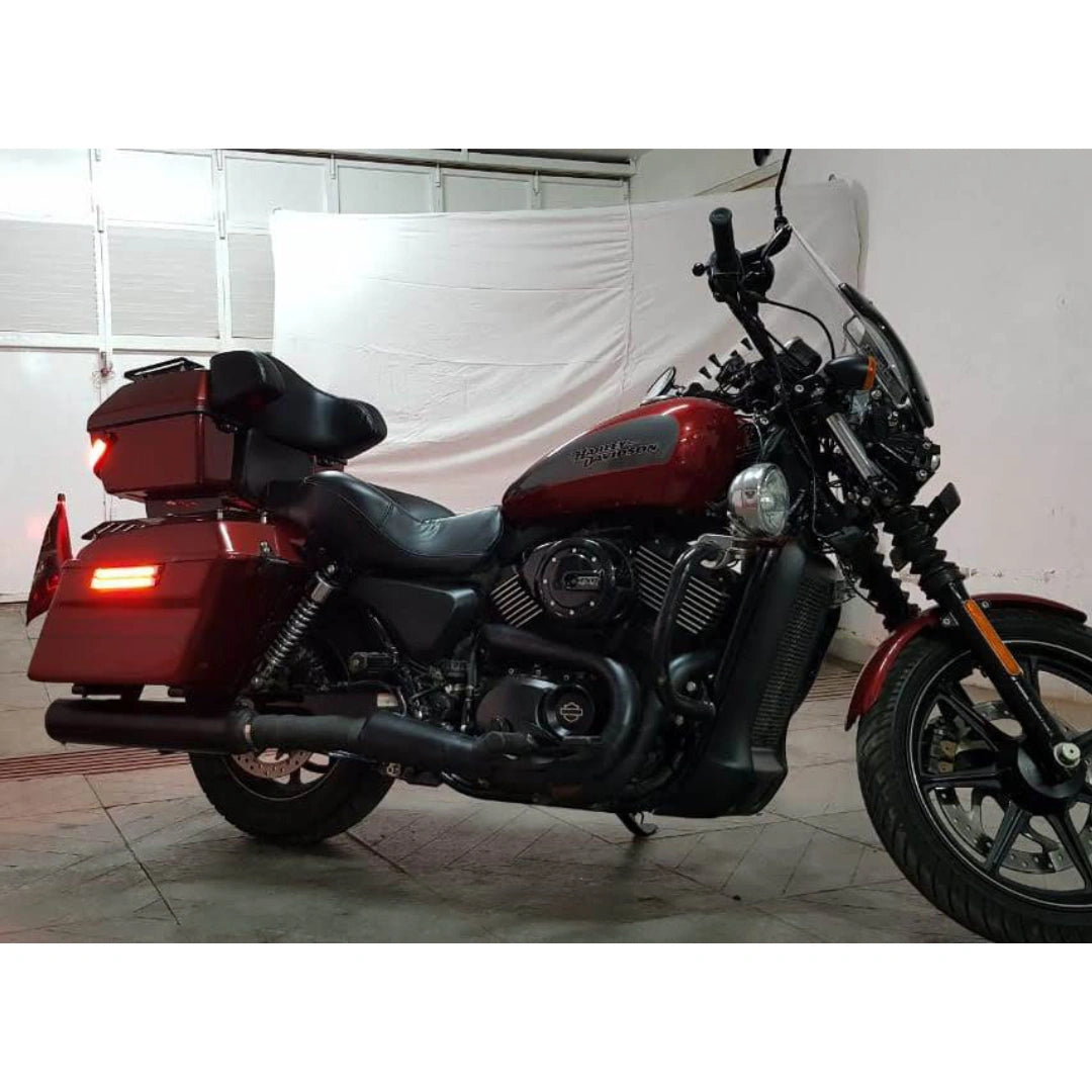 Motorcycle fitted with touring side panniers and matching rear luggage box