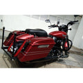 Red motorcycle with matching touring panniers fitted on both sides