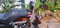 Tall pillion backrest installed on a red motorcycle, viewed from the side