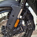 Close-up of AeeDEA front mudslinger installed near the right side of the Pan America front wheelClose-up of AeeDEA front mudslinger installed near the right side of the Pan America front wheel