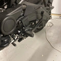 Close-up of AeeDEA heel shifter installed on Harley-Davidson Pan America