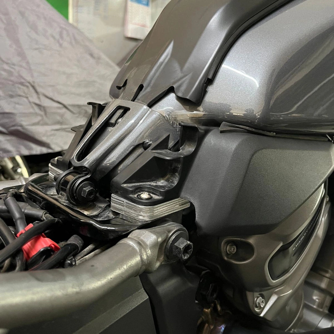 Side view of AeeDEA seat incliners installed on Harley-Davidson Pan America
