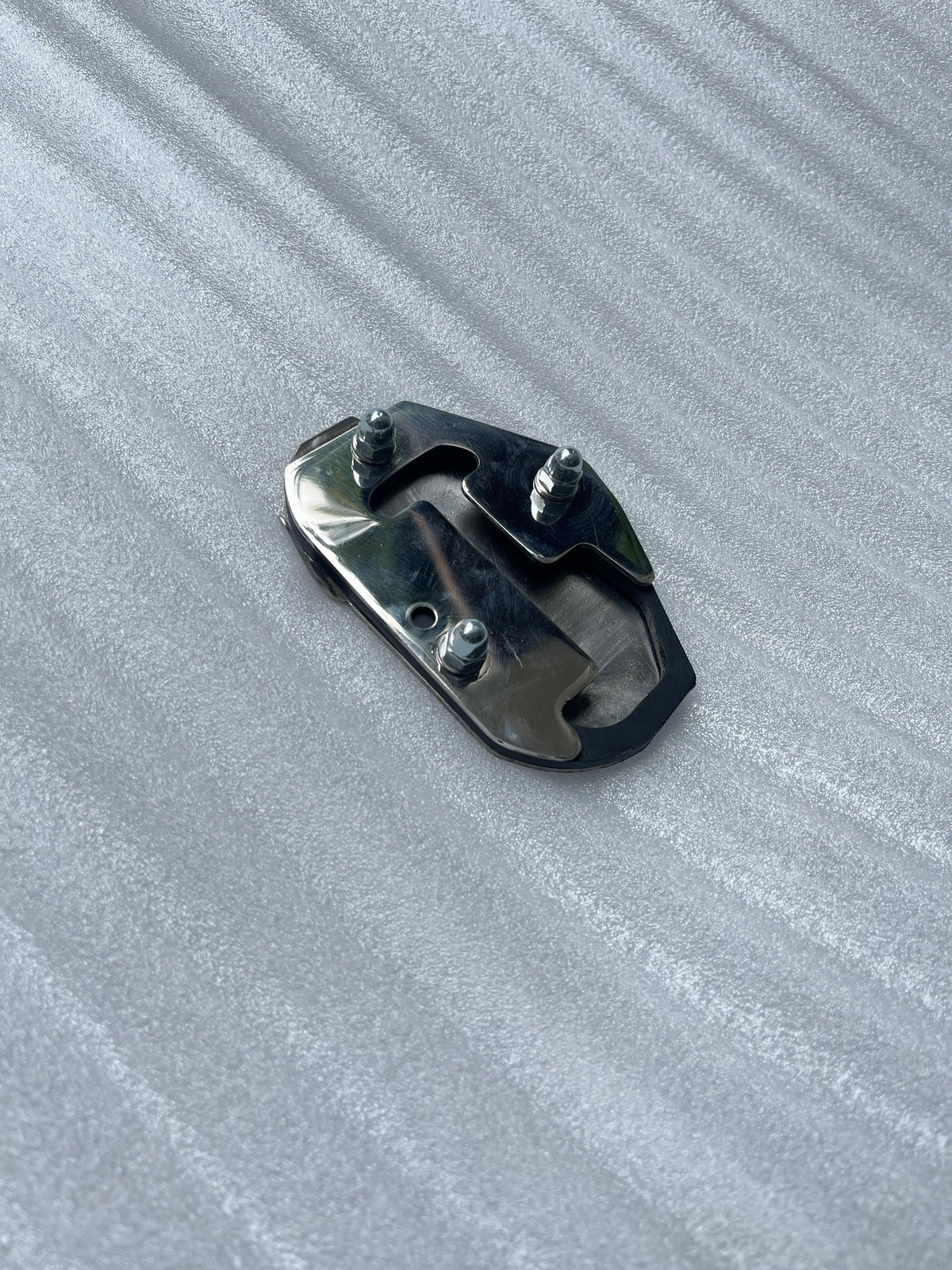 AeeDEA Stand Boot shown from an angled view with stainless steel base plates
