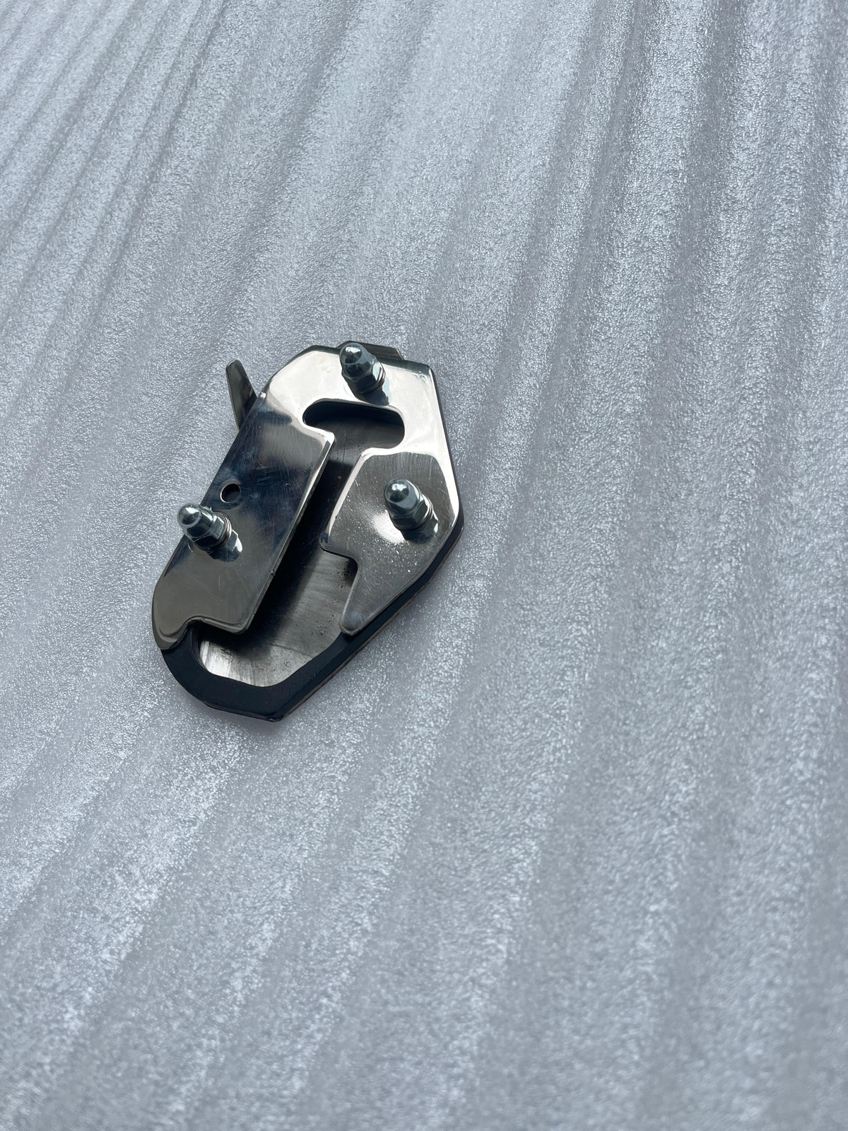 AeeDEA Pan America Stand Boot mounting plate shown from an angled view