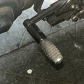AeeDEA toe shifter extender installed on the stock gear shifter of Pan America