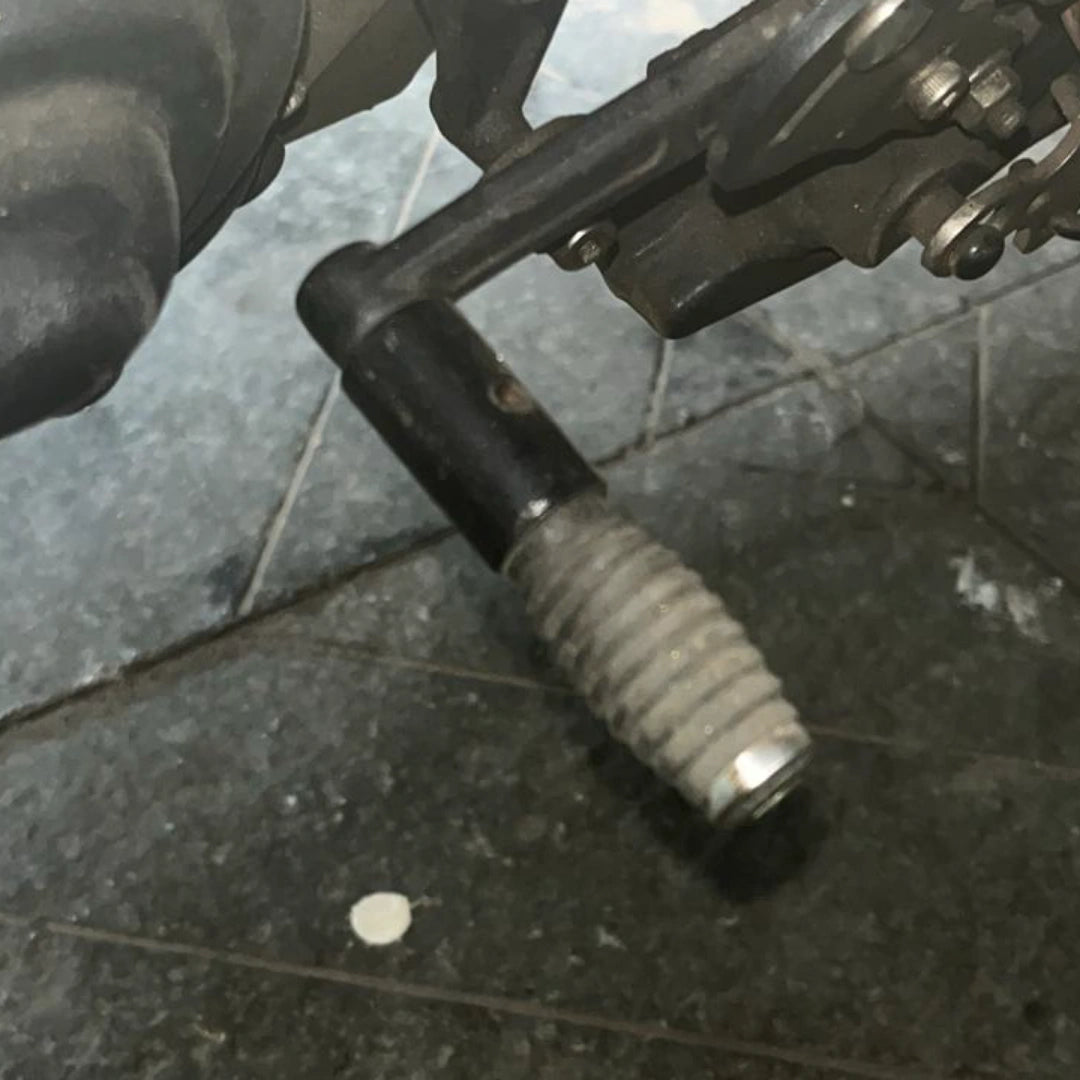 AeeDEA toe shifter extender installed on the stock gear shifter of Pan America
