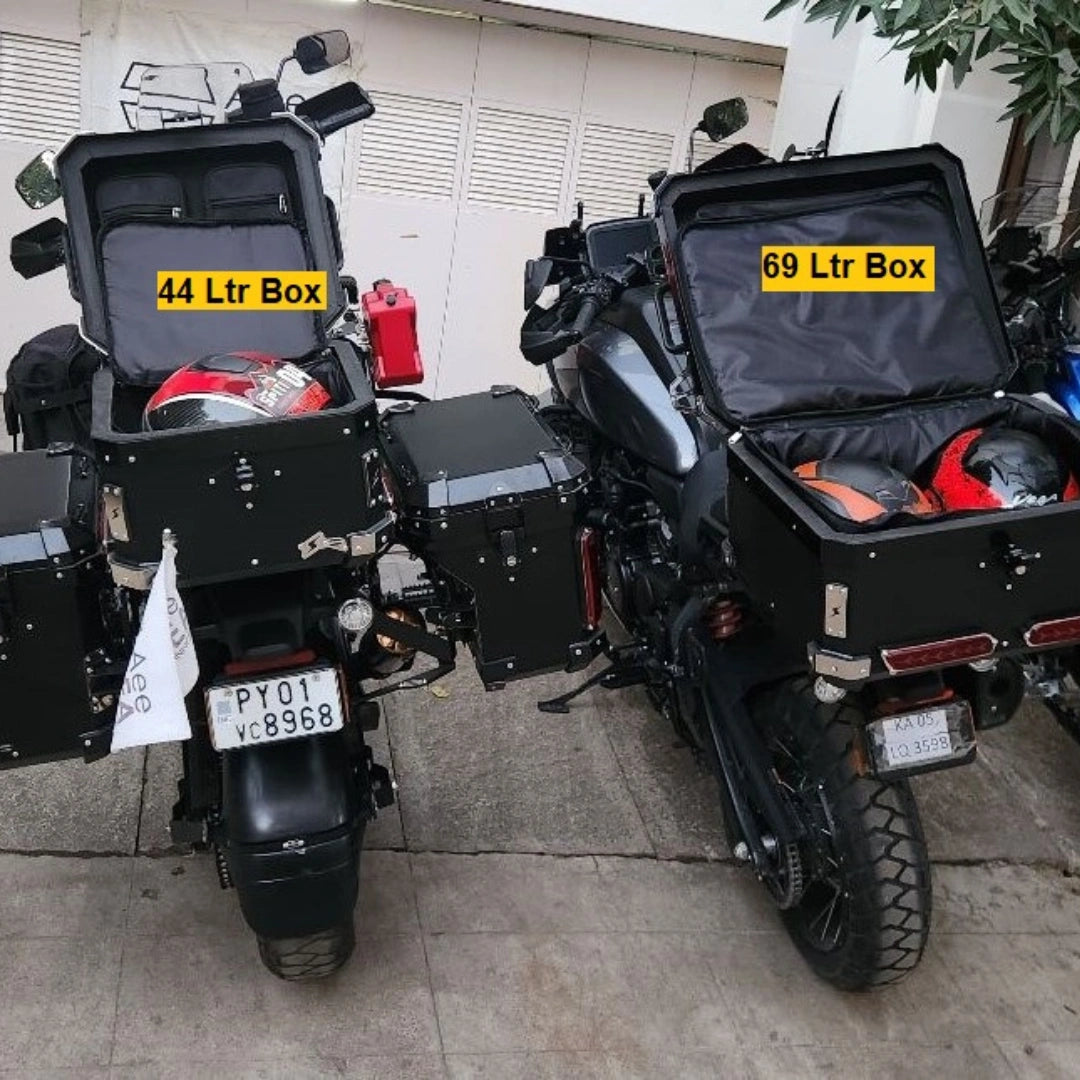 AeeDEA touring top box shown alongside other motorcycle luggage boxes for size comparison