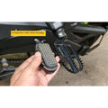 AeeDEA wide pillion footpeg compared with the stock Pan America footpeg