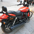 Side profile of a red motorcycle with black engine crash guard installed