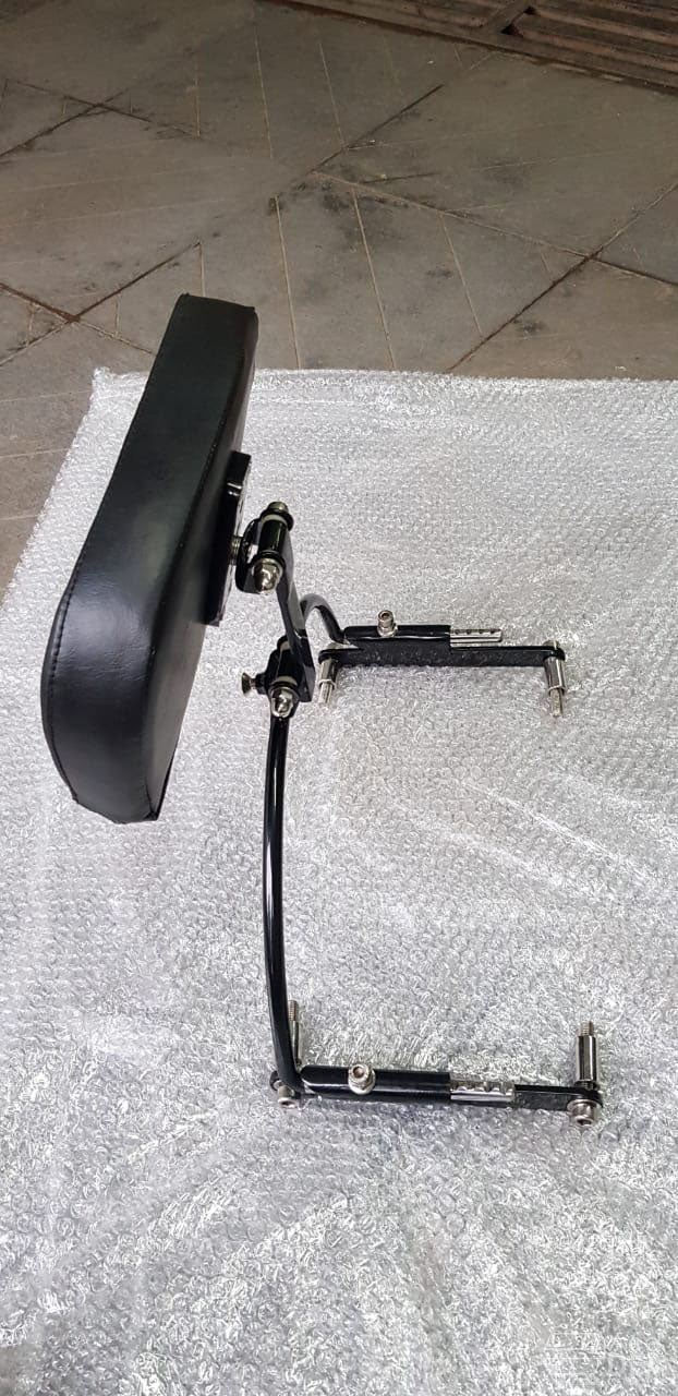 Side view of the motorcycle backrest pad, curved support rod and mounting hardware