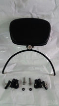 Black rider backrest pad attached to a curved metal support bracket