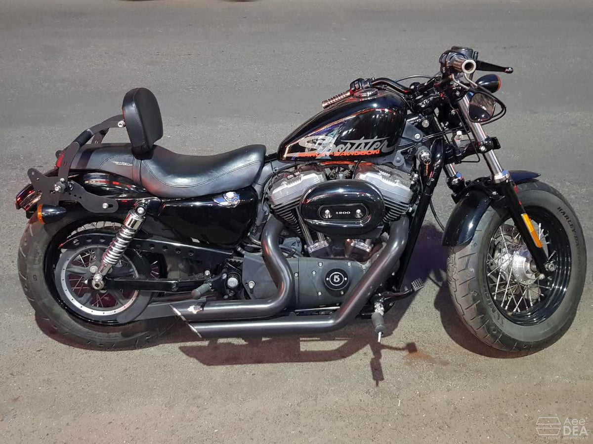 Side view of cruiser motorcycle with rider backrest installed