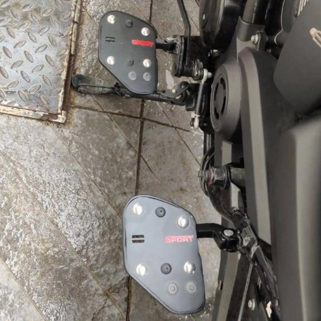 Close-up of motorcycle rider footboard and its mounting position