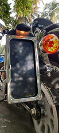 Close-up of the side number plate frame, mounting bracket and adjacent rear indicator