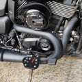 Close-up of a black Sports-style motorcycle footboard with contrasting grip inserts