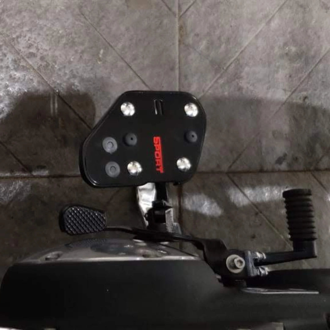 Close-up of the black Sports-style rider footboard with red AeeDEA branding