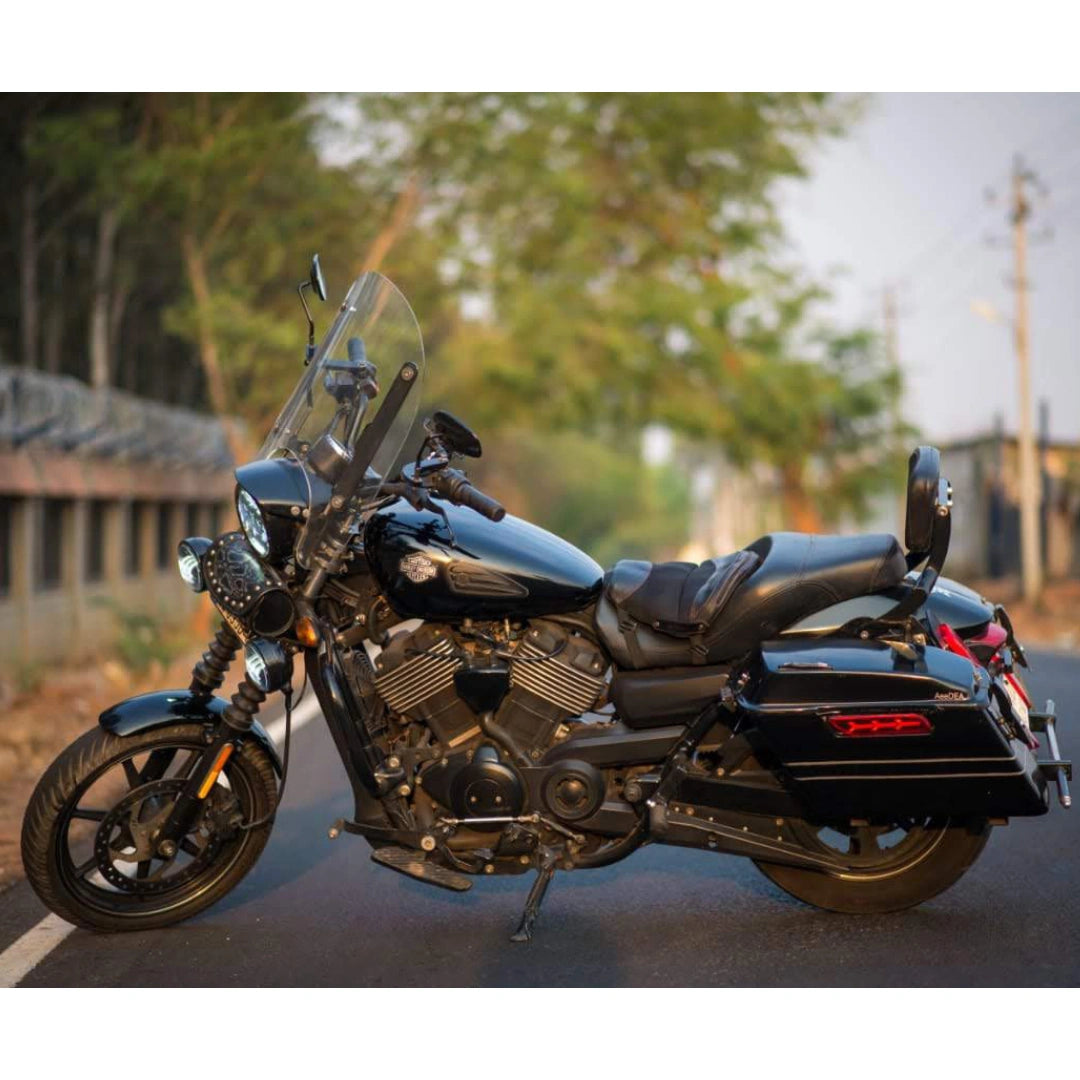 Side view of a blue Harley-Davidson Street 750 fitted with a raised fuel tank