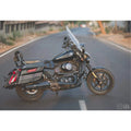 Side view of a Harley-Davidson Street 750 with raised fuel tank on the road