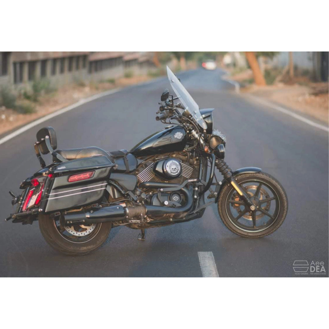 Side view of a Harley-Davidson Street 750 with raised fuel tank on the road
