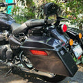 AeeDEA pillion backrest and luggage rack installed with a side pannier on Super Meteor 650