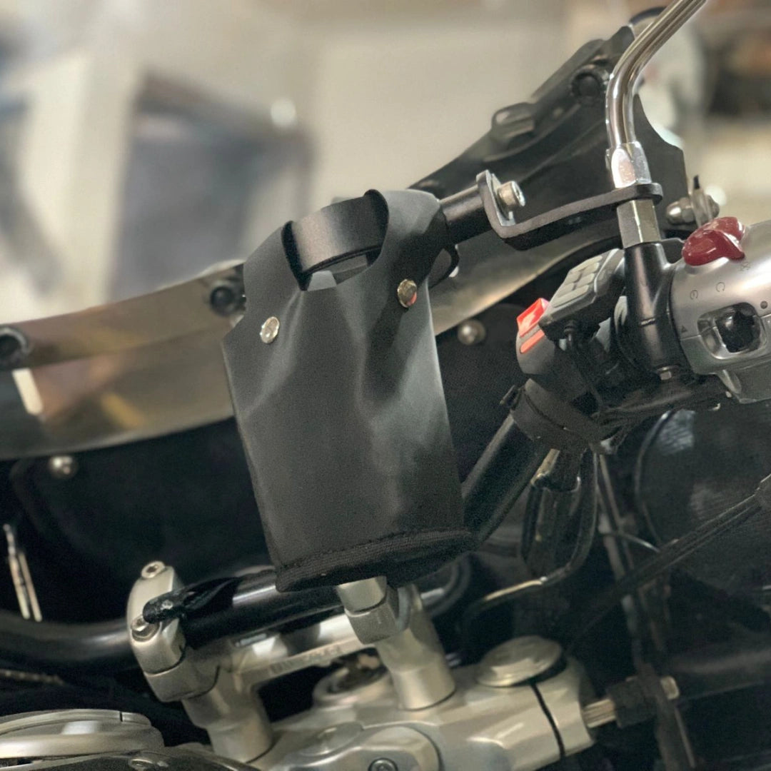 AeeDEA bottle holder with leatherette pouch installed on Royal Enfield Super Meteor 650