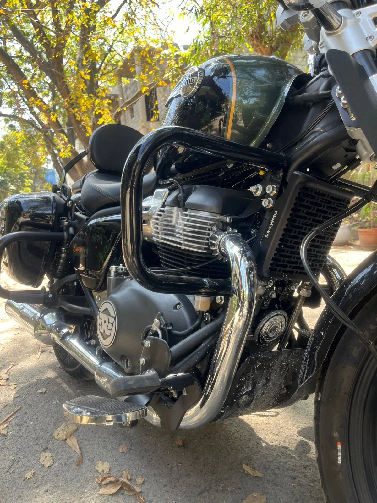 Close-up of AeeDEA front crash guard around the engine of Royal Enfield Super Meteor 650