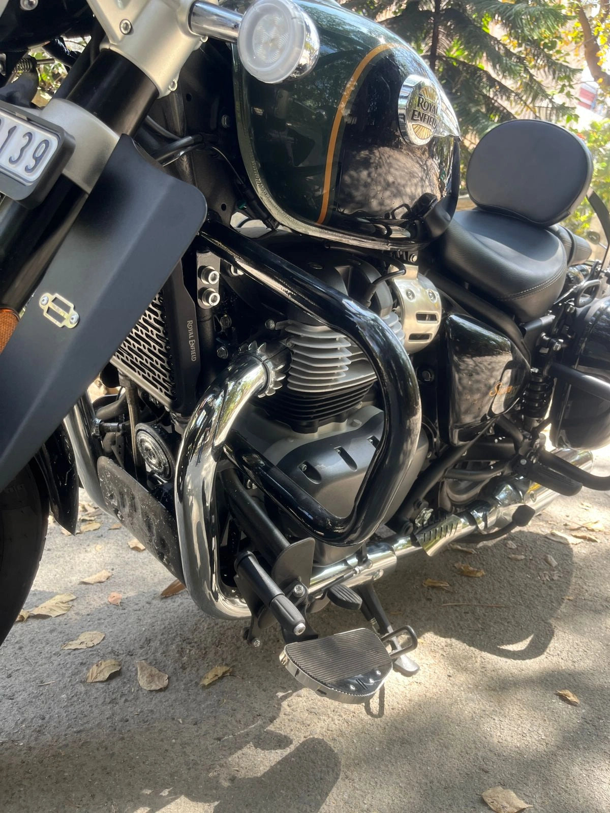 Close-up of AeeDEA front crash guard installed around the engine of Super Meteor 650