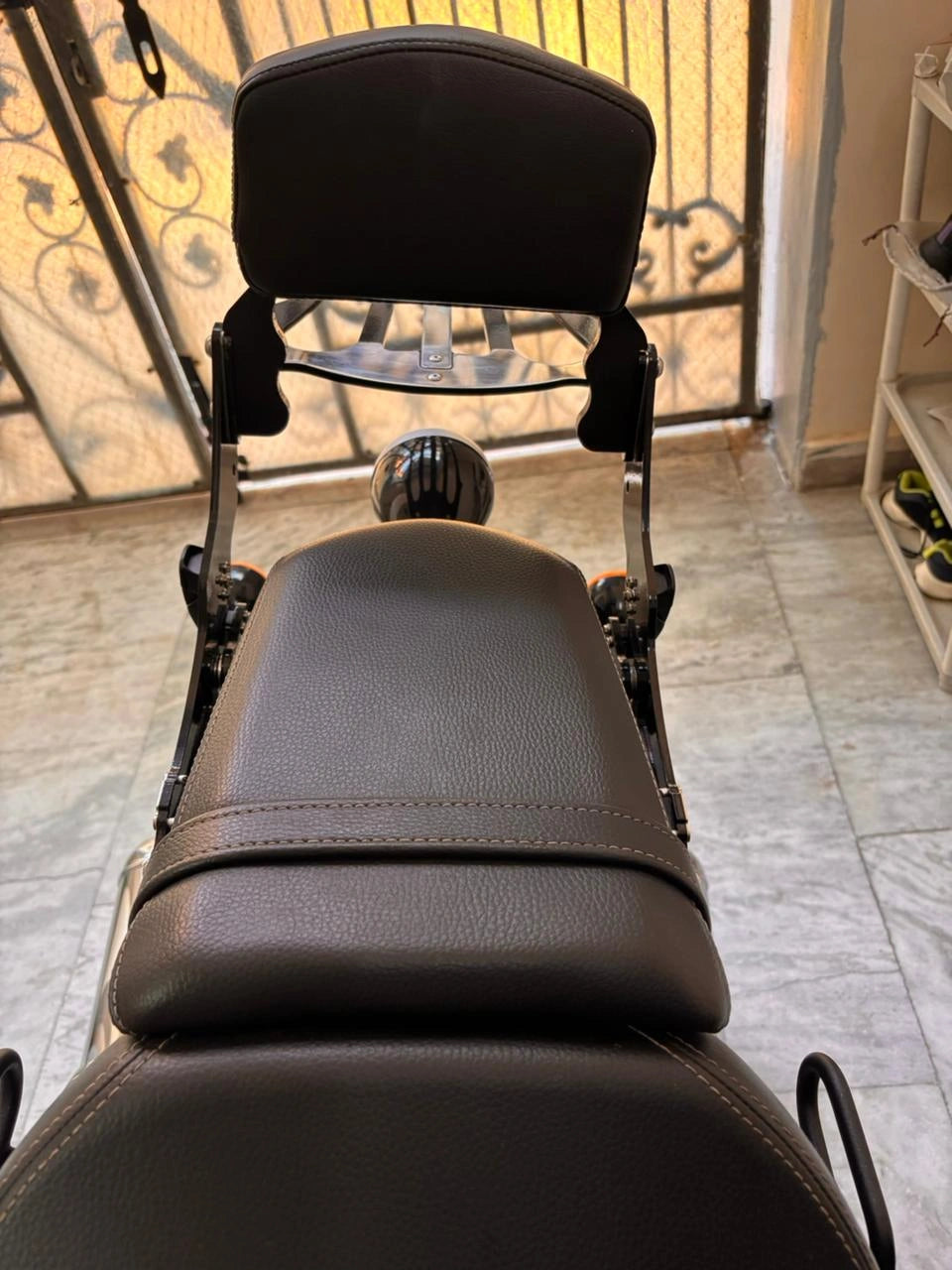 Rear view of AeeDEA pillion backrest fitted to Super Meteor 650 seat