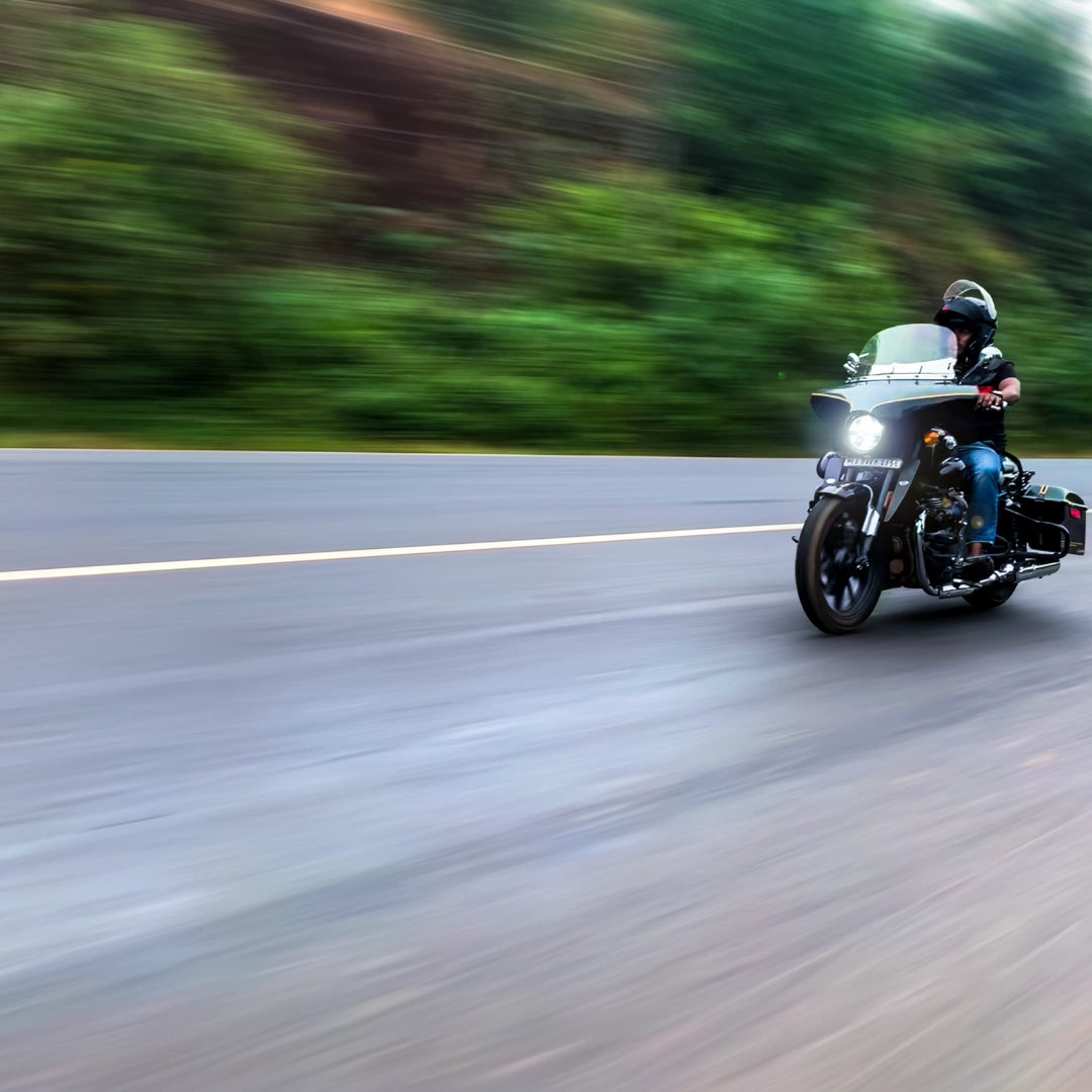 Royal Enfield Super Meteor 650 fitted with AeeDEA wind deflectors while riding