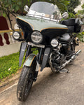 Side view of AeeDEA wind deflector installed on Royal Enfield Super Meteor 650