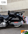 Cruiser motorcycle with a side pannier and integrated red LED light installed