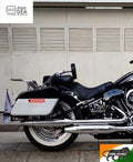 Touring motorcycle fitted with a side pannier featuring an integrated red LED light
